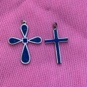 Two blue lapis lazuli cross pendants